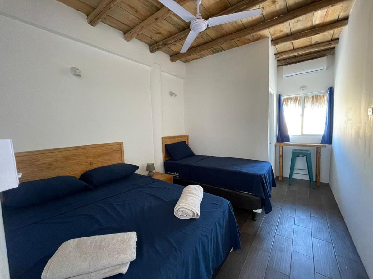 Black Sand Beachhouse Monterrico Bagian luar foto